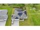 Home with solar panels, driveway, and a swimming pool at 16195 Maya Cir, Punta Gorda, FL 33955