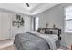 Spacious bedroom with gray bedding and plenty of natural light at 16195 Maya Cir, Punta Gorda, FL 33955