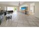 Bright living room with tile floors, and access to backyard at 695 Coronado Dr, Punta Gorda, FL 33950