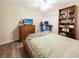Comfortable bedroom with wood furniture and sliding glass doors at 695 Coronado Dr, Punta Gorda, FL 33950