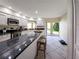 Modern kitchen with granite countertops and stainless steel appliances at 695 Coronado Dr, Punta Gorda, FL 33950