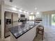 Kitchen boasts stainless steel appliances and granite countertops at 695 Coronado Dr, Punta Gorda, FL 33950