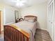 Cozy bedroom with wood-framed bed and plenty of closet space at 695 Coronado Dr, Punta Gorda, FL 33950