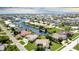 Aerial view of waterfront homes and community at 695 Coronado Dr, Punta Gorda, FL 33950