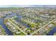 Aerial view of waterfront homes and community at 695 Coronado Dr, Punta Gorda, FL 33950