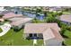 Aerial view of the property showcasing its location by the canal at 695 Coronado Dr, Punta Gorda, FL 33950