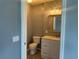 Updated half bathroom with modern vanity at 2140 Heron Lake Dr # 204, Punta Gorda, FL 33983