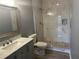 Updated bathroom with marble shower and pebble floor at 2140 Heron Lake Dr # 204, Punta Gorda, FL 33983