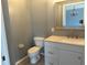 Half-bath with updated vanity and toilet at 2140 Heron Lake Dr # 204, Punta Gorda, FL 33983