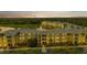 Aerial view of community with lake and buildings at 2140 Heron Lake Dr # 204, Punta Gorda, FL 33983