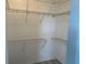 Walk-in closet with wire shelving at 2140 Heron Lake Dr # 204, Punta Gorda, FL 33983