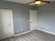 Bedroom with laminate flooring and double door closet at 2140 Heron Lake Dr # 204, Punta Gorda, FL 33983