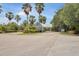 Community entrance with flag and landscaping at 2140 Heron Lake Dr # 204, Punta Gorda, FL 33983