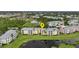 Aerial view showing building location and pond at 2140 Heron Lake Dr # 204, Punta Gorda, FL 33983