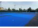 Newly resurfaced blue tennis courts at 2140 Heron Lake Dr # 204, Punta Gorda, FL 33983