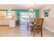 Bright dining room with glass-top table and view of water at 416 Bal Harbor Blvd, Punta Gorda, FL 33950