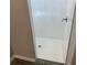 Large walk-in shower with tiled walls at 13460 Tolman Ave, Port Charlotte, FL 33953