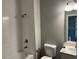 Bathroom with shower/tub combo and modern vanity at 13460 Tolman Ave, Port Charlotte, FL 33953