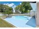 Inviting swimming pool with surrounding patio and lounge chairs at 14010 Dominion Ct, Tampa, FL 33613