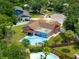 Bird's-eye view of home, showcasing large backyard and pool at 14010 Dominion Ct, Tampa, FL 33613