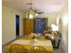 Comfortable living room with floral furniture and a hanging pendant light at 25275 Rampart Blvd # 2001, Punta Gorda, FL 33983
