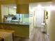 Open-concept living area connects the kitchen and entryway for easy flow at 25275 Rampart Blvd # 2001, Punta Gorda, FL 33983