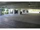 Covered parking garage with designated parking spots at 5116 Melbourne St # B105, Punta Gorda, FL 33980