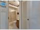 Bathroom with tub/shower combo, vanity and linen closet at 25275 Rampart Blvd # 1801, Punta Gorda, FL 33983