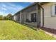 Screened porch alongside the house, overlooking the yard at 25275 Rampart Blvd # 2001, Punta Gorda, FL 33983