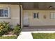 Condo building exterior with walkway and landscaping at dusk at 25275 Rampart Blvd # 2001, Punta Gorda, FL 33983
