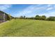 Large grassy backyard, providing ample outdoor space at 25275 Rampart Blvd # 2001, Punta Gorda, FL 33983