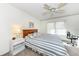 Guest bedroom with a queen-size bed and home office space at 3251 White Ibis Ct # A4, Punta Gorda, FL 33950