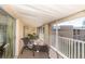 Private screened balcony with lounge chair and table at 3251 White Ibis Ct # A4, Punta Gorda, FL 33950