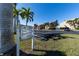Community entrance with parking and signage at 3251 White Ibis Ct # A4, Punta Gorda, FL 33950
