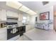 Clean kitchen featuring white cabinets and stove at 3251 White Ibis Ct # A4, Punta Gorda, FL 33950