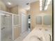Large bathroom with double vanity and walk-in shower at 1519 Atares Dr # 112, Punta Gorda, FL 33950