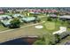 Aerial view of home with green roof, near golf course at 1519 Atares Dr # 112, Punta Gorda, FL 33950