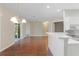 Spacious dining area with wood flooring and access to a patio at 1519 Atares Dr # 112, Punta Gorda, FL 33950