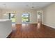 Bright living room with hardwood floors and view of golf course at 1519 Atares Dr # 112, Punta Gorda, FL 33950