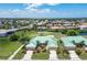 Aerial view of home near golf course with attractive landscaping at 1519 Atares Dr # 112, Punta Gorda, FL 33950