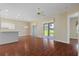 Bright living room with hardwood floors and sliding glass doors at 1519 Atares Dr # 112, Punta Gorda, FL 33950