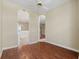 Formal dining room with hardwood floors and arched entryways at 1519 Atares Dr # 112, Punta Gorda, FL 33950