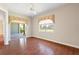 Bedroom with patio access and golf course view at 1519 Atares Dr # 112, Punta Gorda, FL 33950