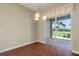 Dining room with patio access and golf course view at 1519 Atares Dr # 112, Punta Gorda, FL 33950