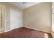 Spacious bedroom with laminate flooring and large closet at 1519 Atares Dr # 112, Punta Gorda, FL 33950