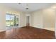 Living area with hardwood floors and sliding glass doors at 1519 Atares Dr # 112, Punta Gorda, FL 33950