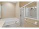 Bathroom features a shower and garden tub at 1519 Atares Dr # 112, Punta Gorda, FL 33950
