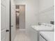 Laundry room with washer, dryer, and access to hallway at 1519 Atares Dr # 112, Punta Gorda, FL 33950