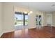 Bright dining room with sliders leading to the backyard at 1519 Atares Dr # 112, Punta Gorda, FL 33950