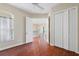 Bright bedroom with wood floors and access to kitchen at 1519 Atares Dr # 112, Punta Gorda, FL 33950